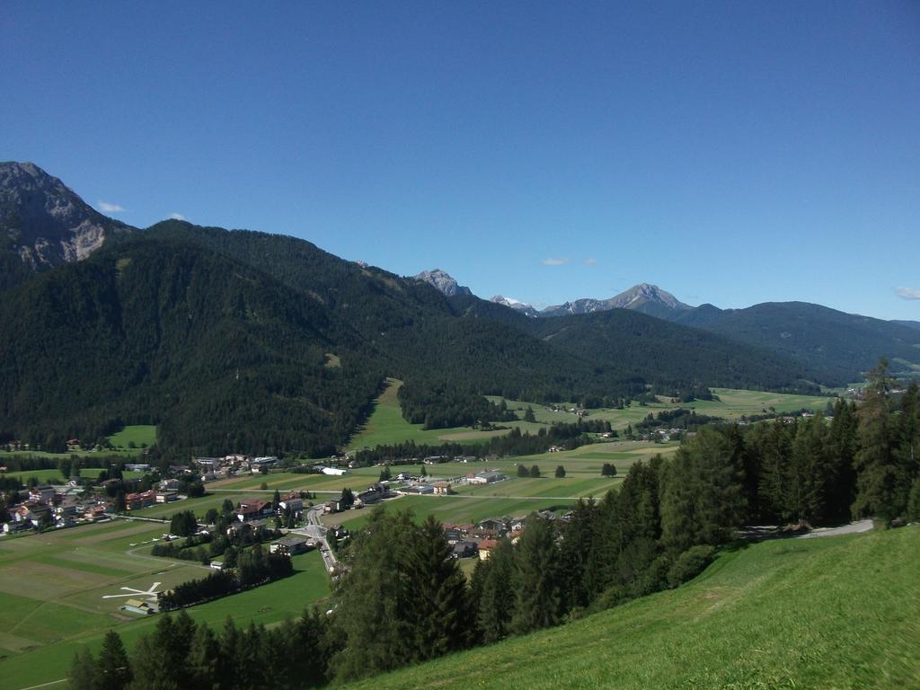 Steinerhof Apartamento Dobbiaco Quarto foto